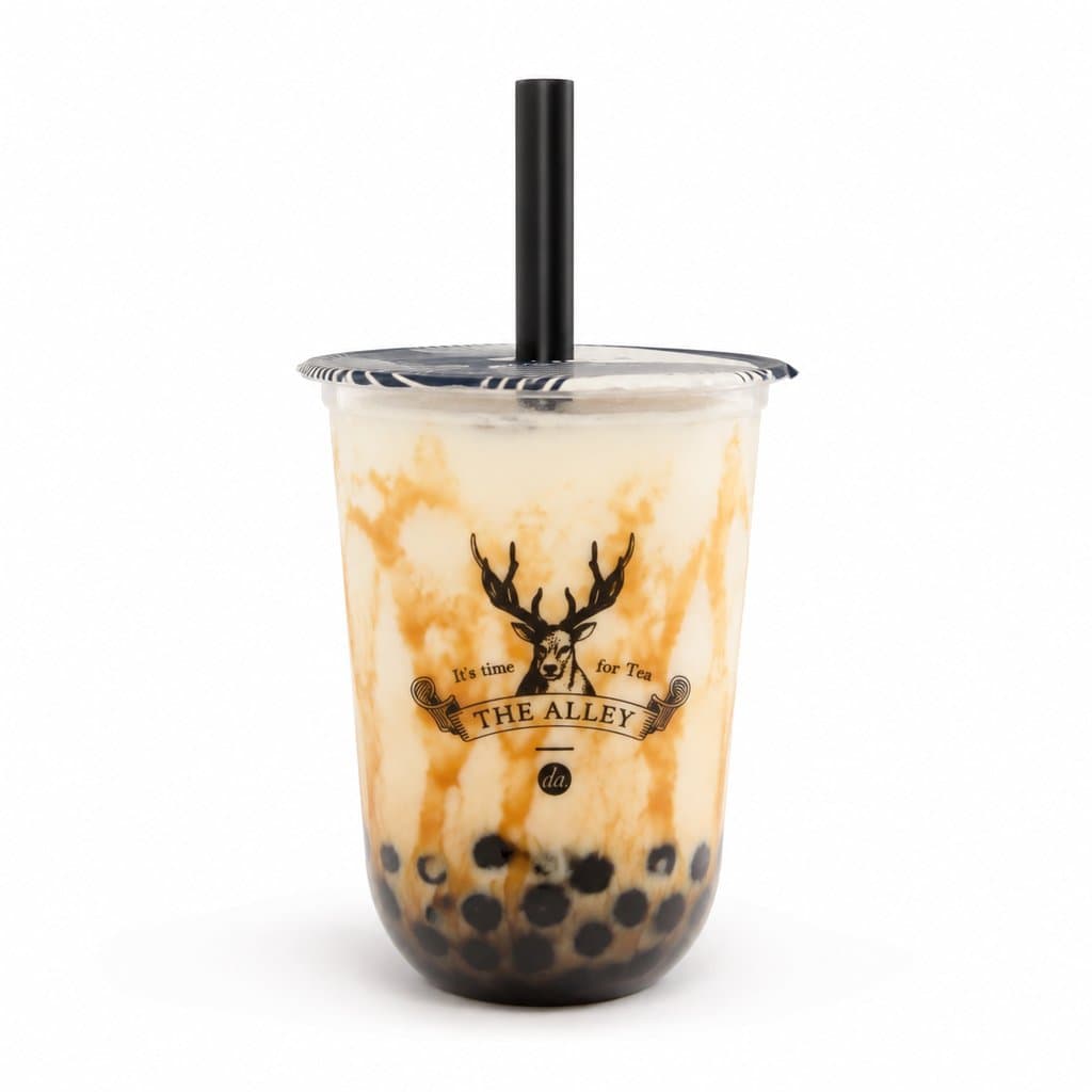 透明奶茶杯，内含珍珠奶茶，杯身印有鹿头logo和'THE ALLEY'字样，配黑色吸管和封膜盖，现代都市写实风格