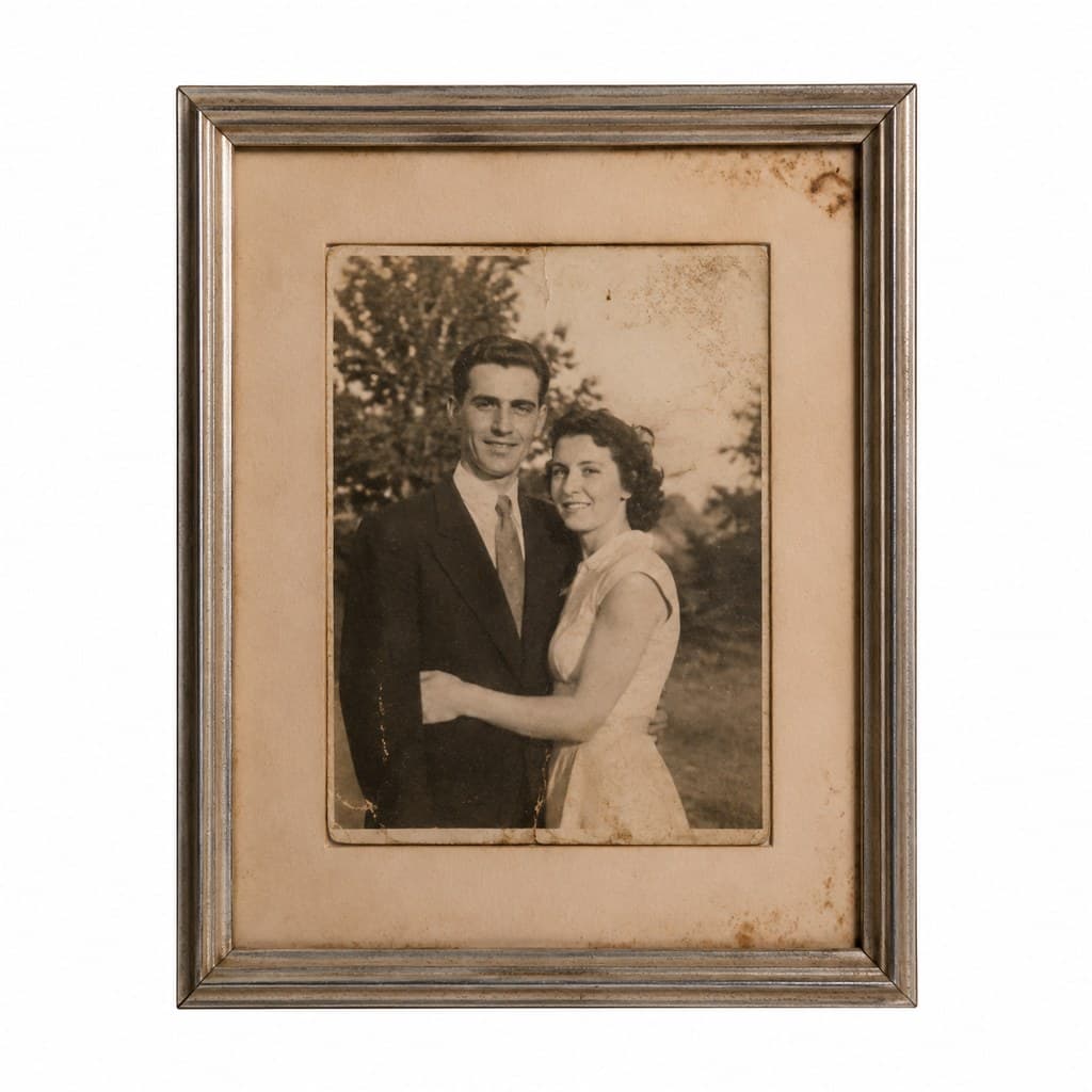 faded old photograph in simple frame