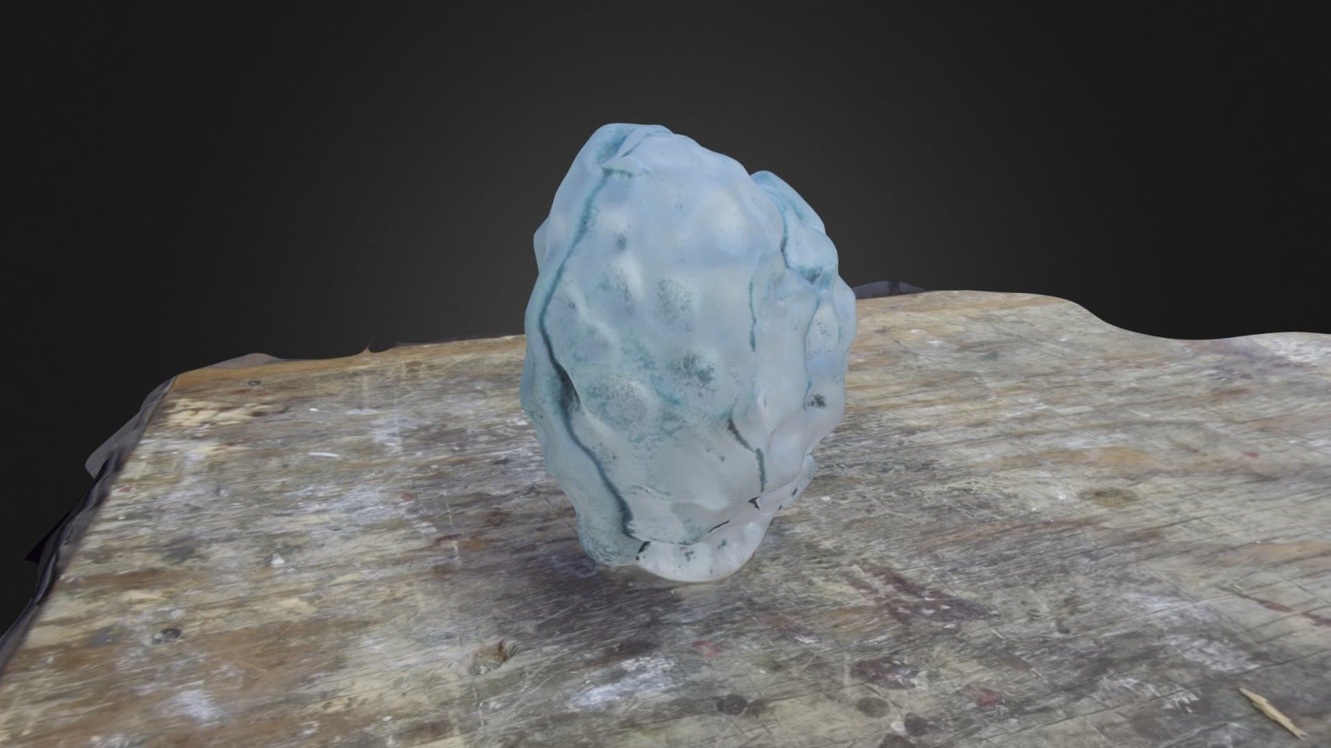 蓝色脑珊瑚3D扫描模型，置于木质表面，细节纹理清晰，AI生成风格